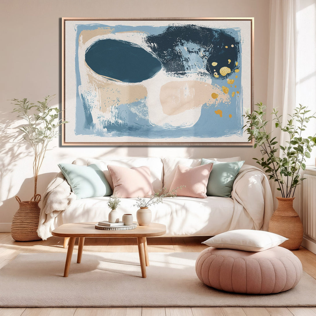 Framed Wall Art: Abstract art canvas print in a modern living room. Features blue, beige, and gold color palette. Perfect for adding a touch of style.