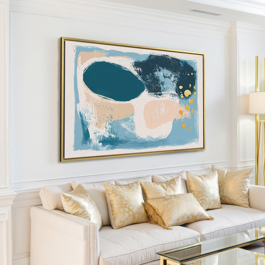 Abstract Canvas Print art in a modern living room. Features a blue, beige, and gold color palette. Perfect for adding style to your space.