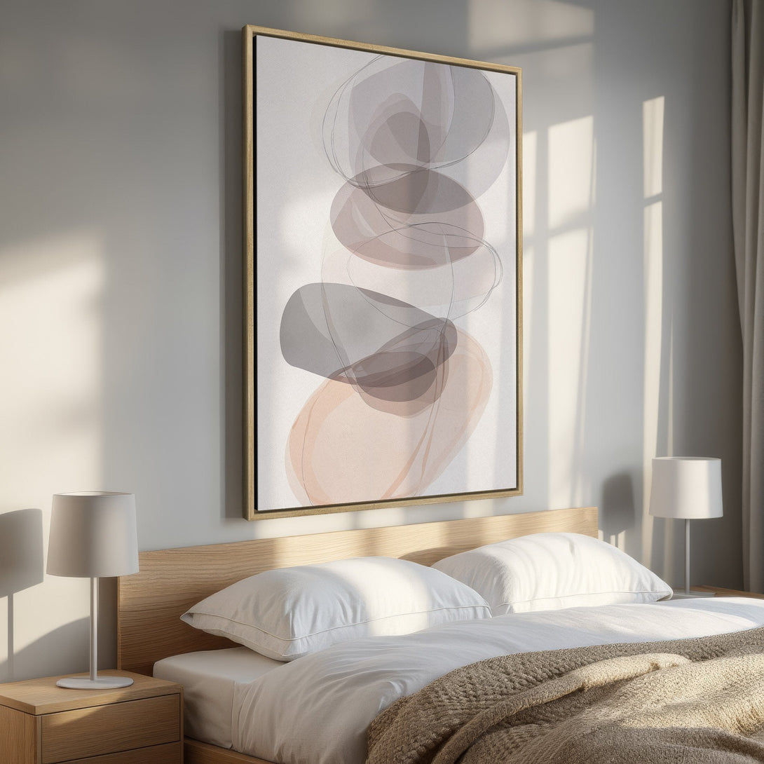 Framed Wall Art: Abstract art Canvas Print with neutral tones. Modern bedroom decor featuring a calming color palette of beige, gray, and blush.