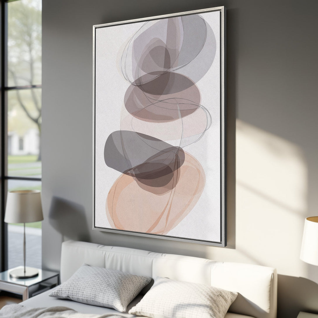 Framed Wall Art featuring abstract organic shapes in a neutral color palette of gray, brown, and peach. Modern art for your home.