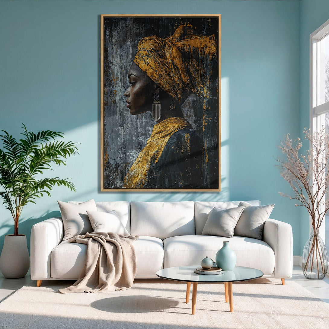 Framed Wall Art featuring an elegant Black woman in gold. Abstract art style, with a warm gold and gray color palette. Perfect for living room decor.