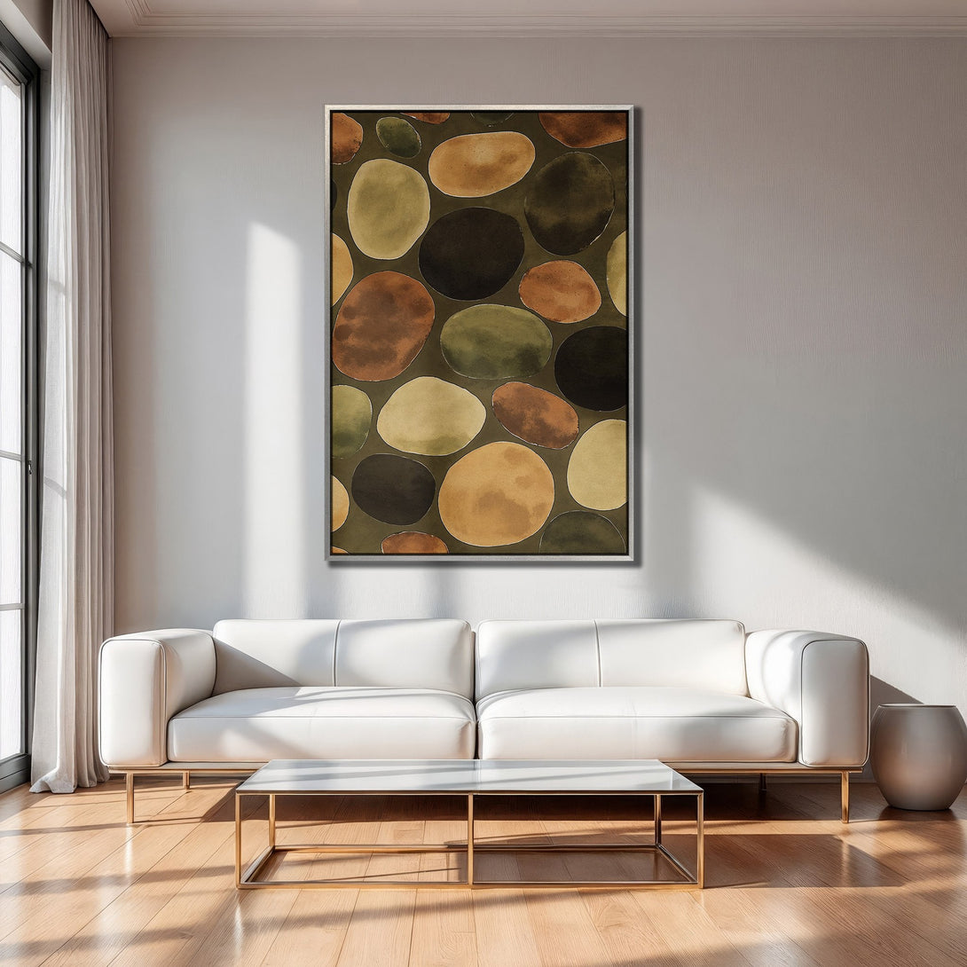 Framed Wall Art featuring abstract pebble design in warm earth tones, perfect for living room decor. Modern art canvas print.