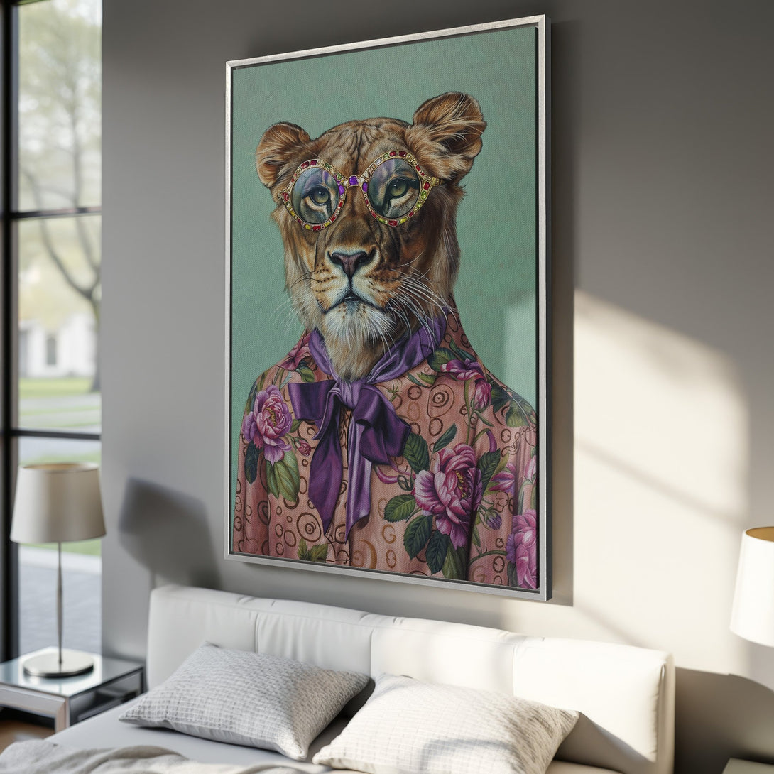 Framed Wall Art of a lion wearing glasses and floral shirt. A unique piece with a pink, purple, and green color palette, perfect for adding personality to any space.