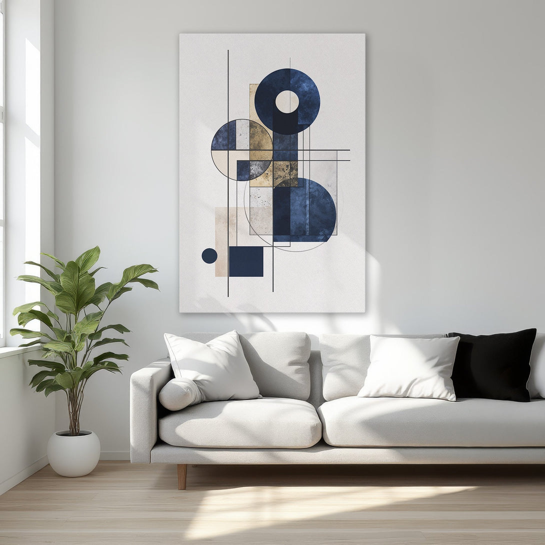 Framed Wall Art featuring an abstract geometric design in navy blue, gold, and beige. Modern art for a stylish interior.