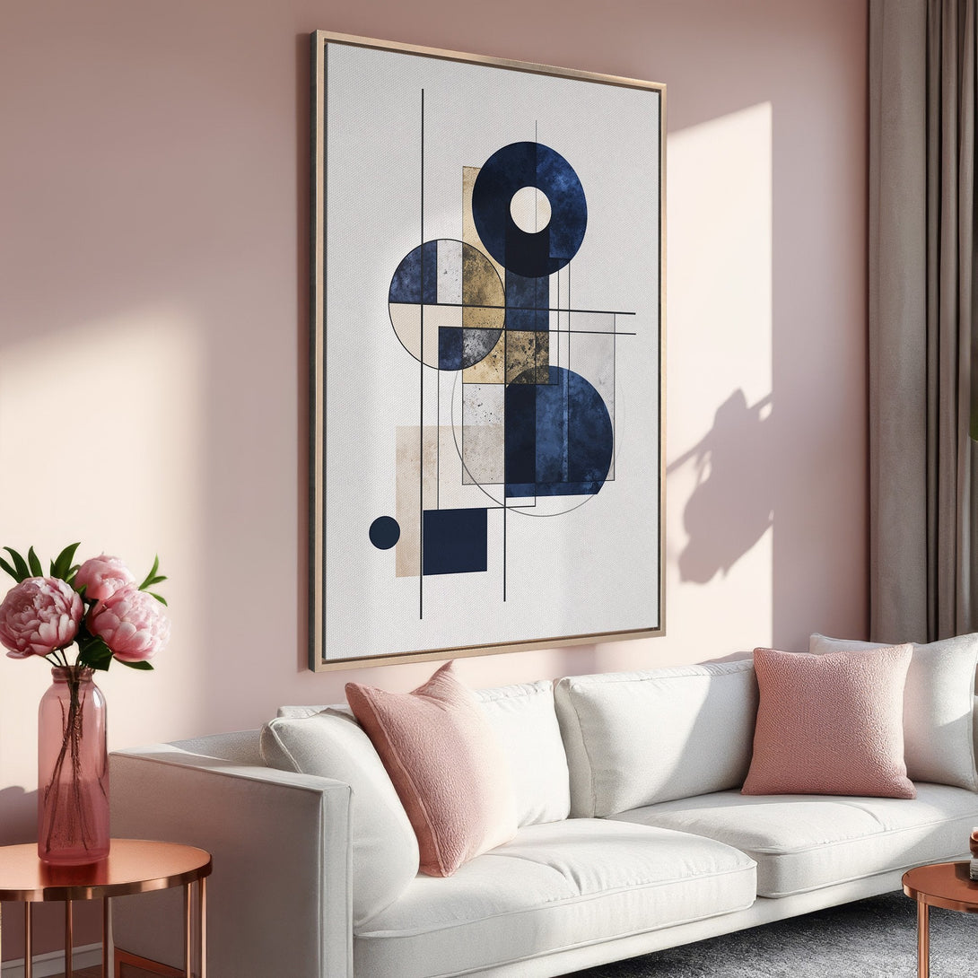 Framed Wall Art featuring a modern geometric design in navy, gold, and beige. Perfect for adding a touch of elegance to your living room.