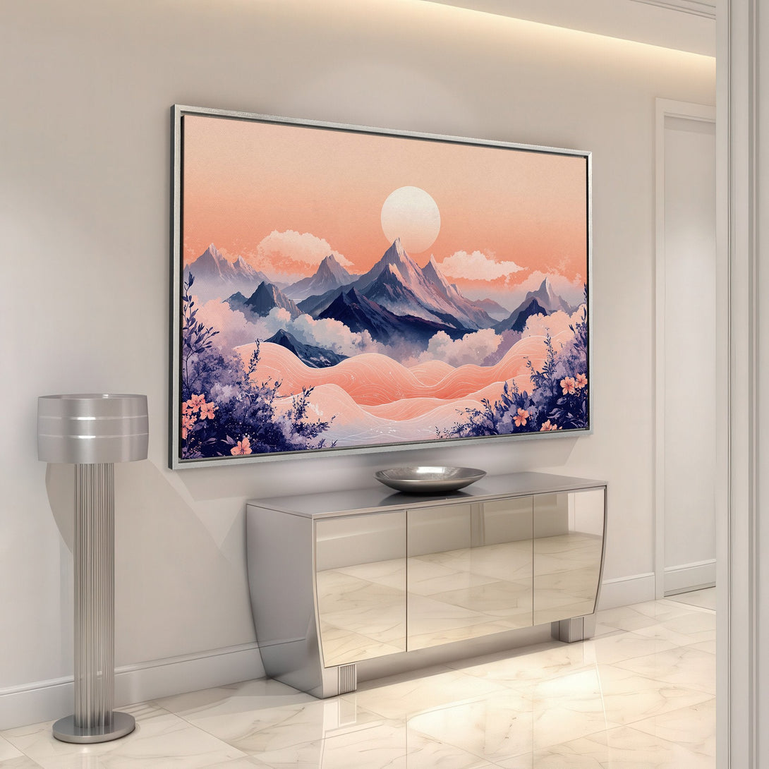 Framed Wall Art: Mountain landscape canvas print in warm peach and blue tones, perfect for adding a touch of serenity to any space.