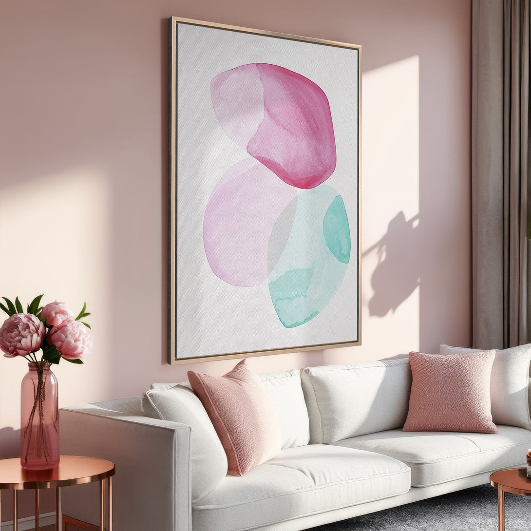 Framed Wall Art featuring abstract watercolor shapes in pink and teal. Modern art for home decor, perfect for a blush-toned interior.