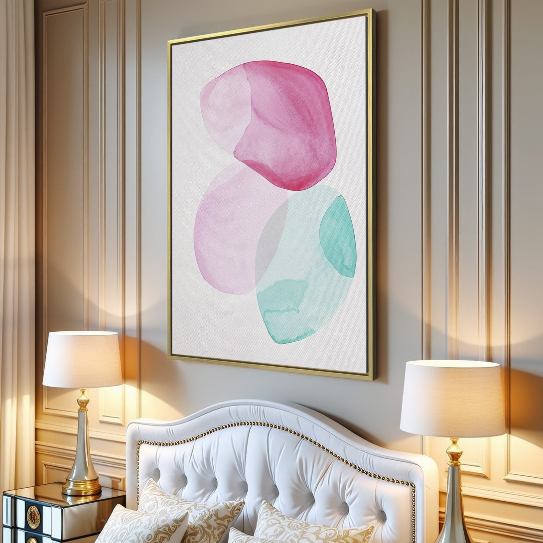 Abstract Canvas Print in a modern interior. Features watercolor shapes in pink, teal, and lavender. Perfect for adding a pop of color!