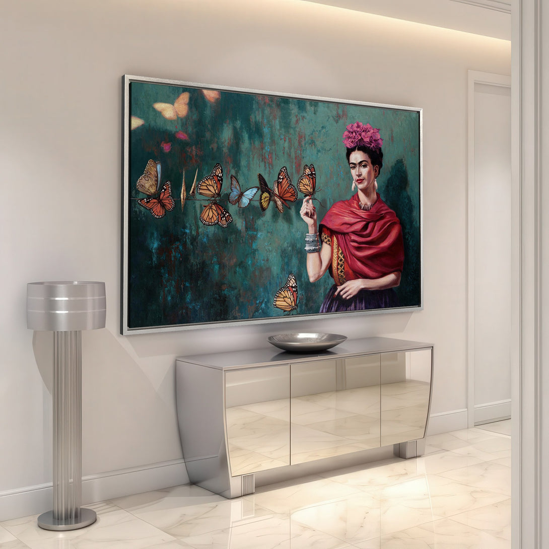 Framed Wall Art featuring Frida Kahlo with butterflies. Vibrant teal, red, and orange palette. Perfect statement piece for your home decor.