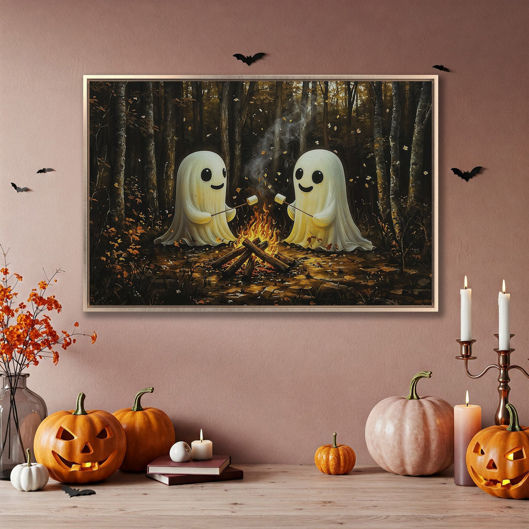 Framed Wall Art featuring cute ghosts roasting marshmallows in a forest, with warm, autumnal color palette. Perfect Halloween decor!