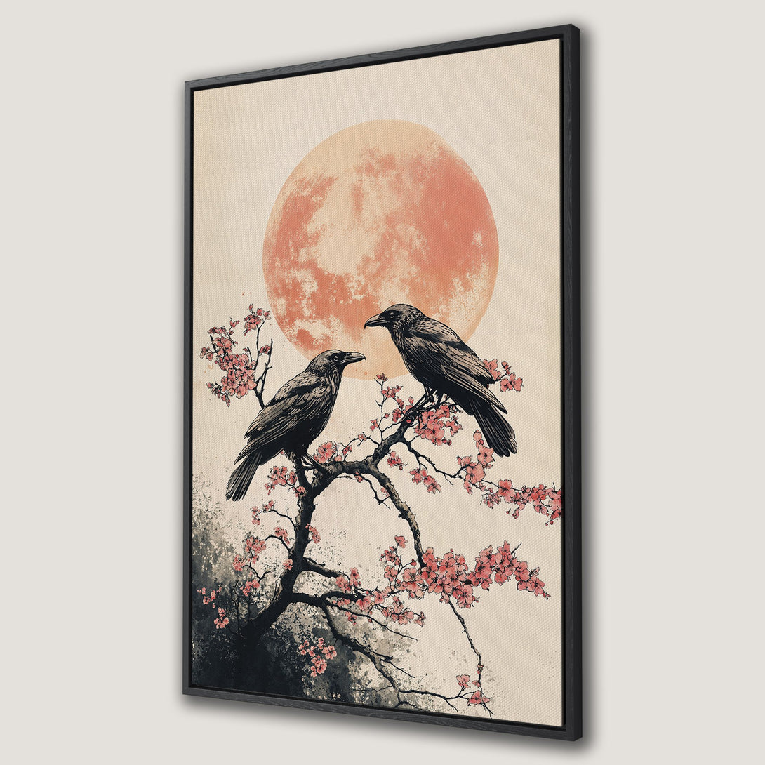 Framed Wall Art featuring two ravens on a cherry blossom branch with a peach-colored moon. Japanese-inspired art with a neutral and pink color palette.