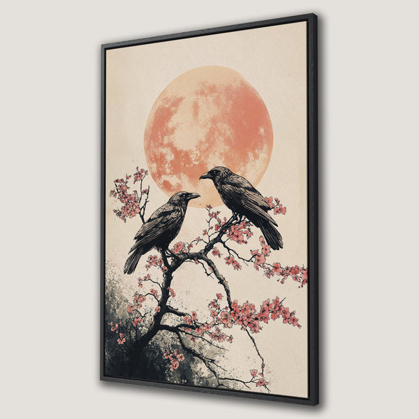 Framed Wall Art featuring two ravens on a cherry blossom branch with a peach-colored moon. Japanese-inspired art with a neutral and pink color palette.