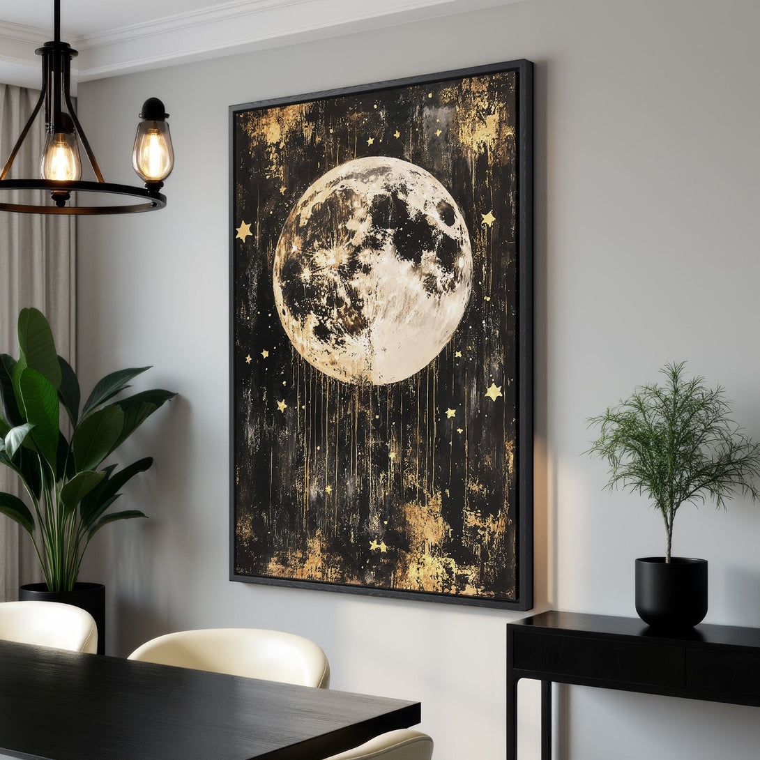 Framed Wall Art featuring a stunning moon and stars in a black and gold abstract style. Perfect for adding celestial elegance to any interior.