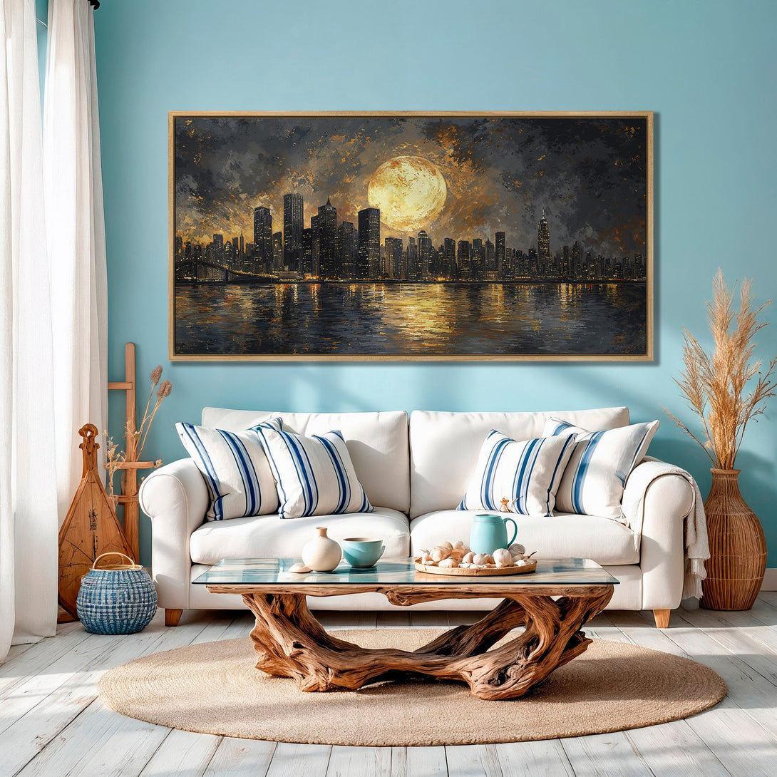 Framed Wall Art of a cityscape with a large moon. Dramatic, modern art in a dark, gold, and blue color palette. Perfect for home decor.