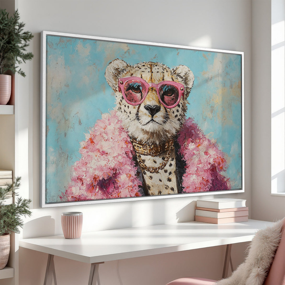 Framed Wall Art: Playful cheetah portrait with pink sunglasses & boa. Stylish artwork in a blue, pink, and gold color palette. Perfect for a chic interior.