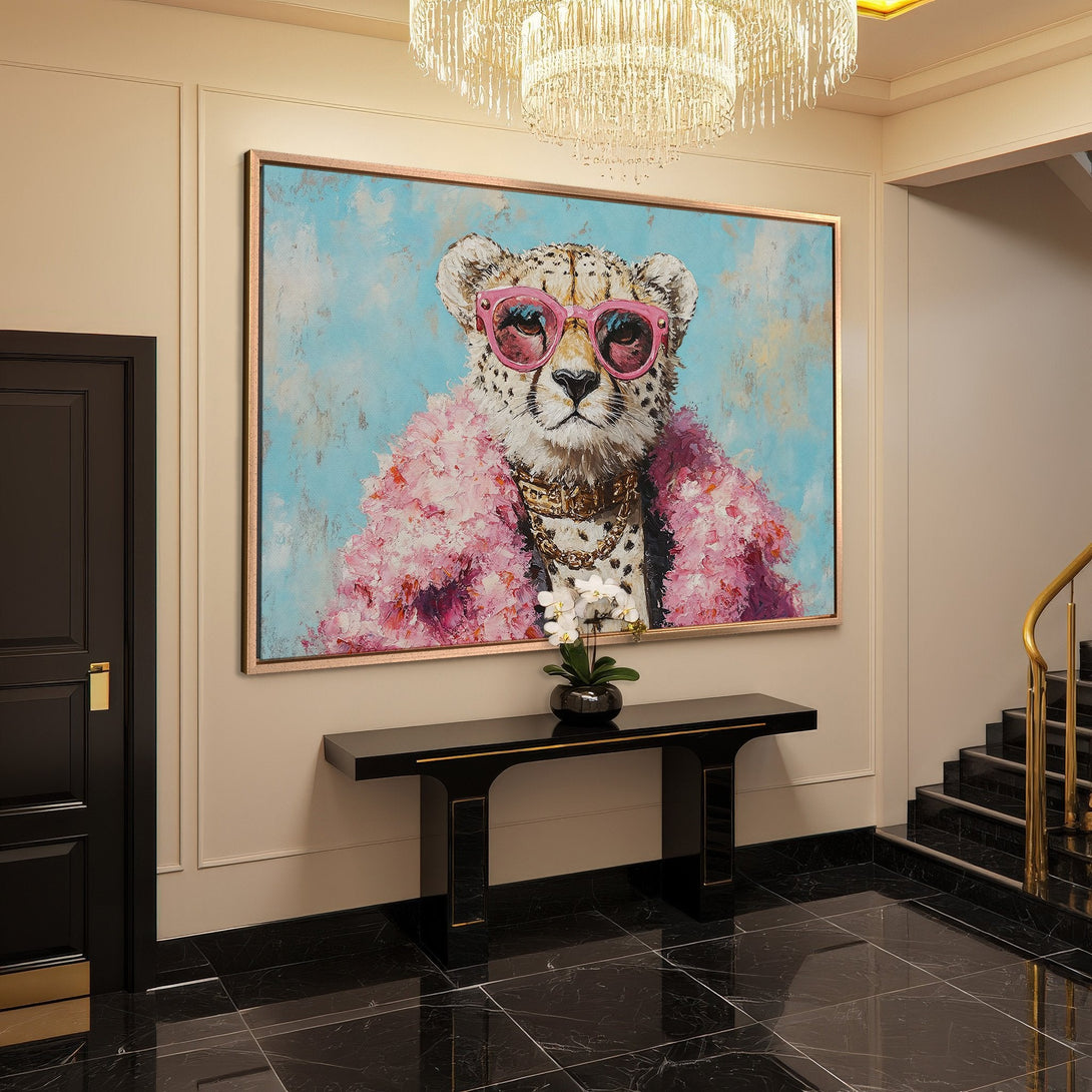 Framed Wall Art: Playful cheetah portrait in pink & blue, adding a touch of luxury to any interior. Modern art with a pop of color.