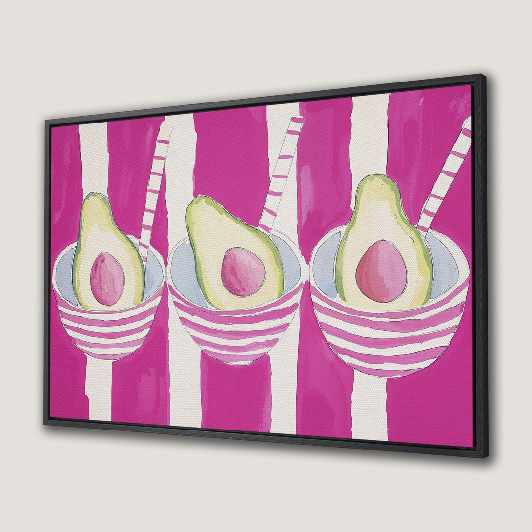Framed Wall Art featuring watercolor avocados in bowls with pink and white stripes. Modern, colorful kitchen decor.