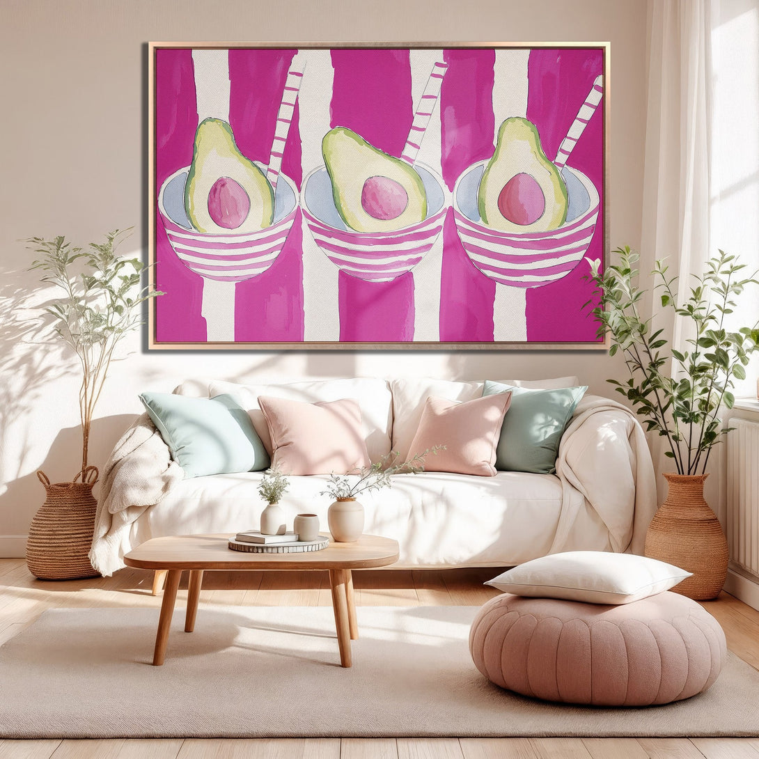 Framed Wall Art: Whimsical avocado painting with pink and white stripes. Bright, colorful art for a modern living room.