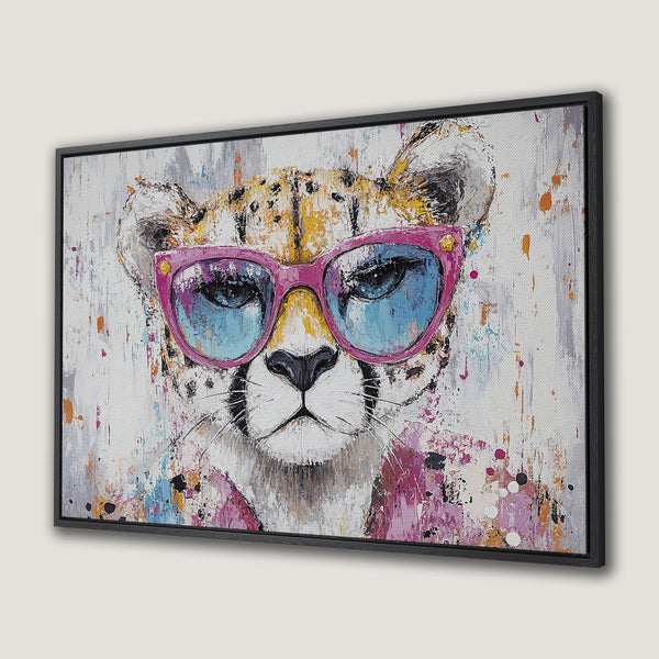 Framed Wall Art: Cool cheetah portrait with pink sunglasses, abstract style, vibrant pinks, blues, and yellows. Perfect wall decor!