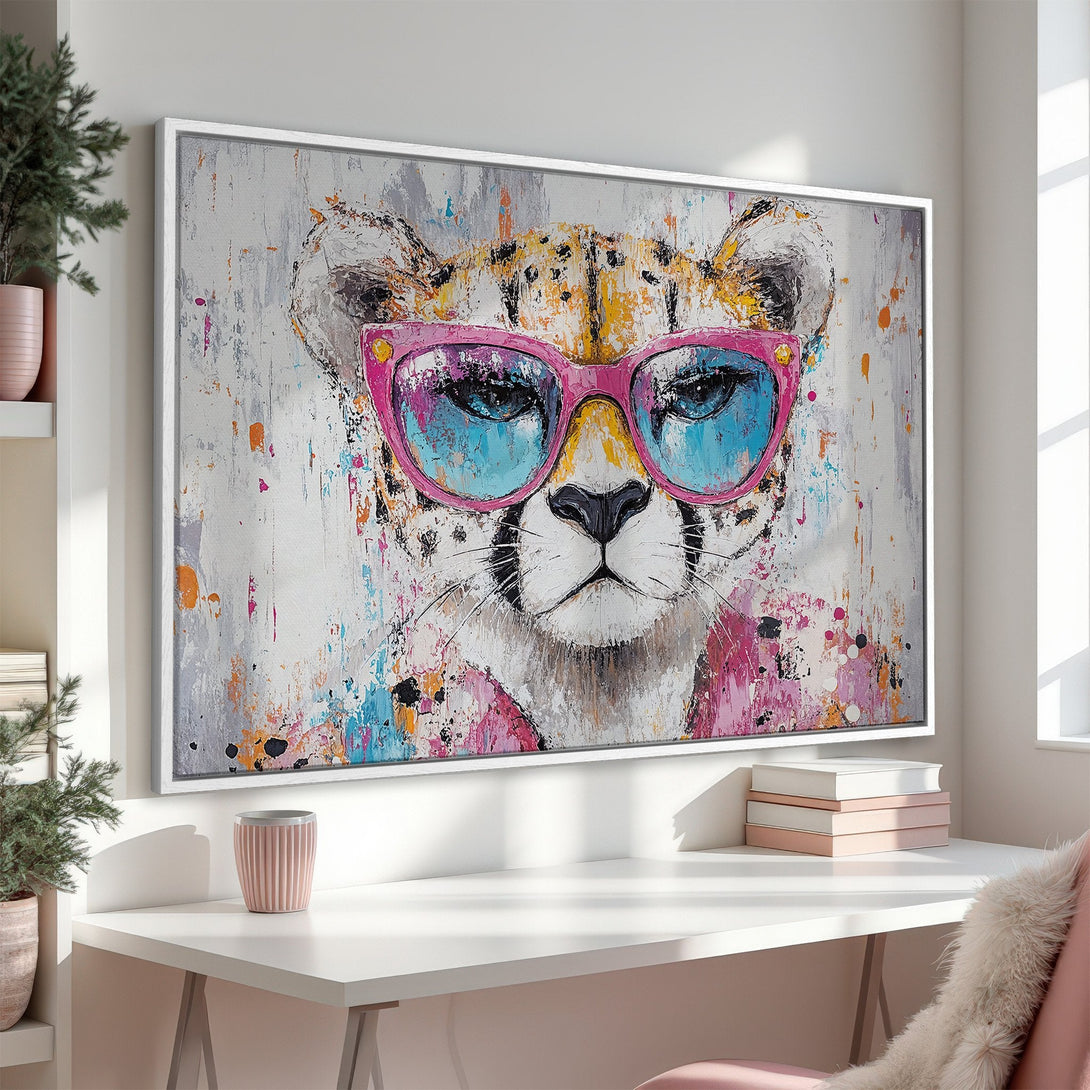 Framed Wall Art: Cool cheetah in sunglasses, abstract style with pink, blue, and yellow accents. Modern decor for a stylish home.