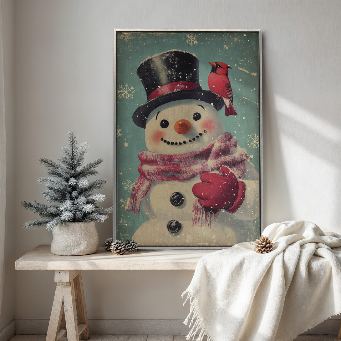 Framed Wall Art featuring a charming snowman with a red cardinal, vintage style. Warm winter colors in teal, red, and white. Perfect holiday decor!