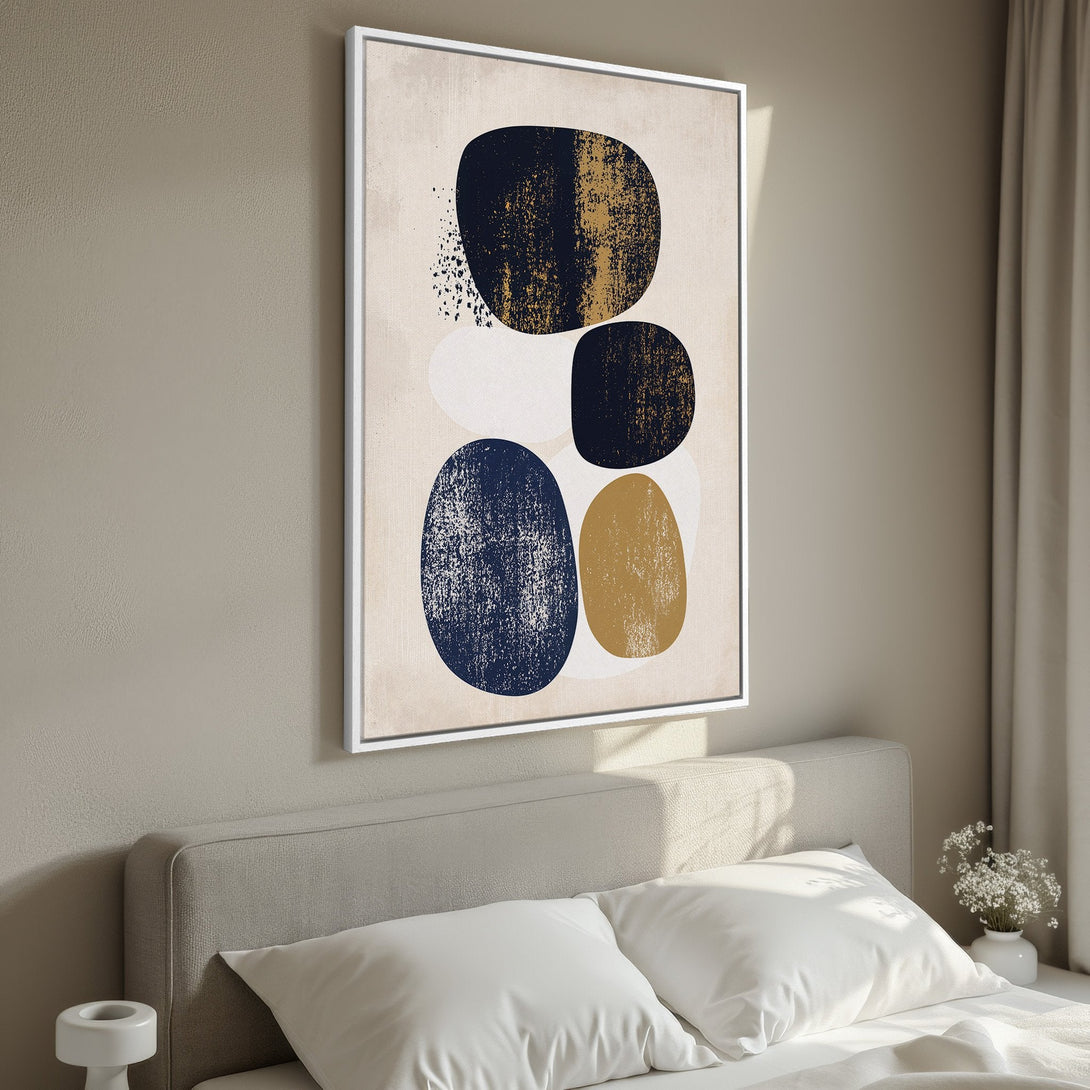 Framed Wall Art: Abstract art print with navy, gold, and white organic shapes. Modern style canvas art for bedroom decor. Neutral color palette.