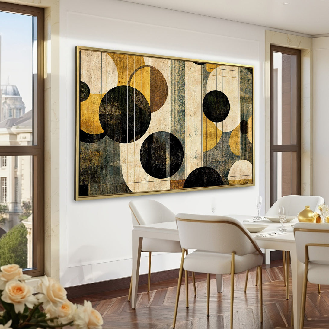 Abstract Canvas Print in a modern interior. Features geometric shapes in black, gold, and beige tones. Perfect for adding style to any room.