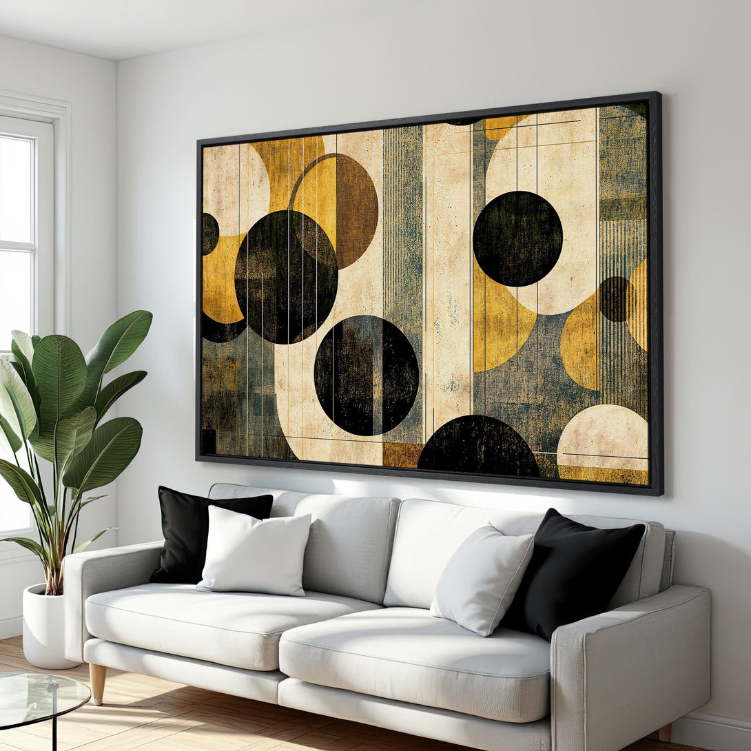 Framed Wall Art featuring an abstract geometric design in a warm color palette of gold, black, and cream. Modern art perfect for living room decor.