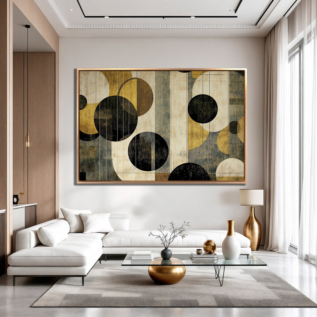Framed Wall Art: Abstract geometric design in a modern living room. Features a neutral color palette with gold, black, and beige tones. Elevate your space!