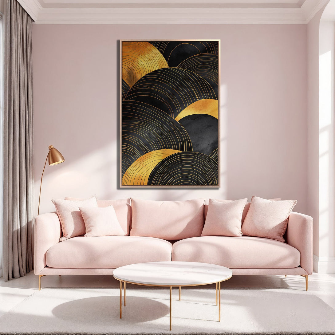 Framed Wall Art featuring abstract gold and black design. Modern art print in a blush-toned interior. Perfect for living room decor.