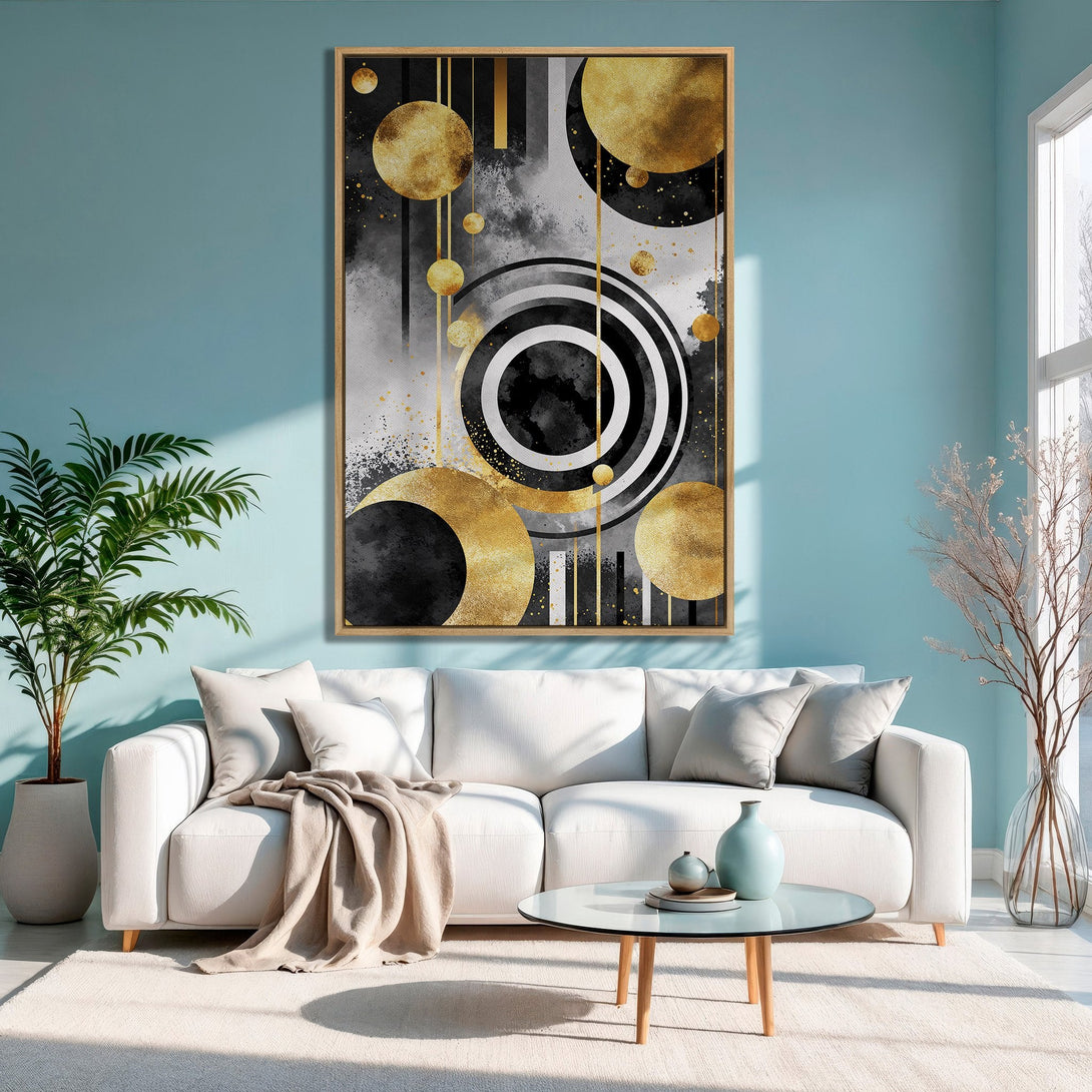 Framed Wall Art featuring a modern abstract design with gold, black, and white circles. Perfect for adding a touch of elegance to your living room.