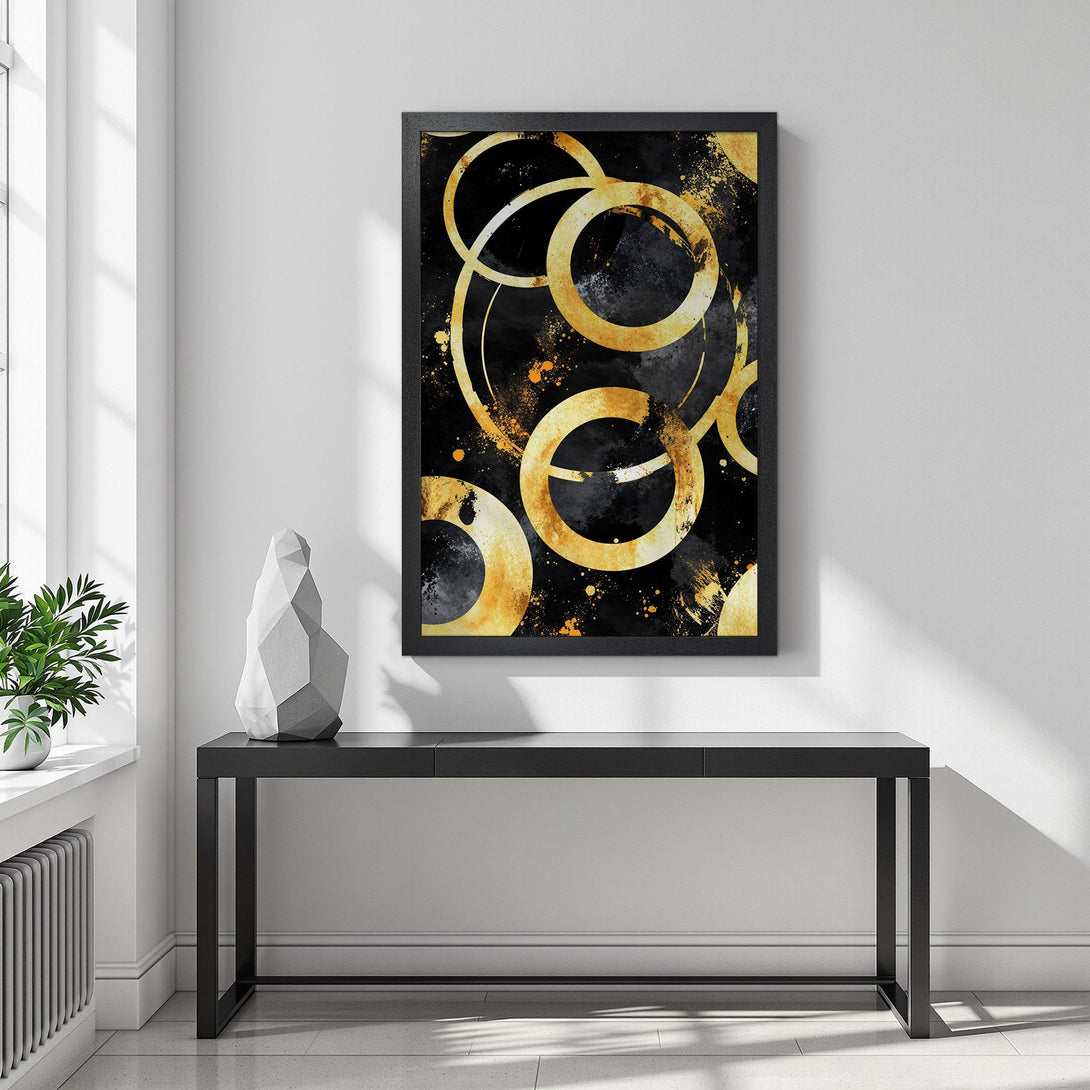 Framed Poster featuring gold abstract circles on black background. Modern art print with gold and black color palette for stylish home decor.