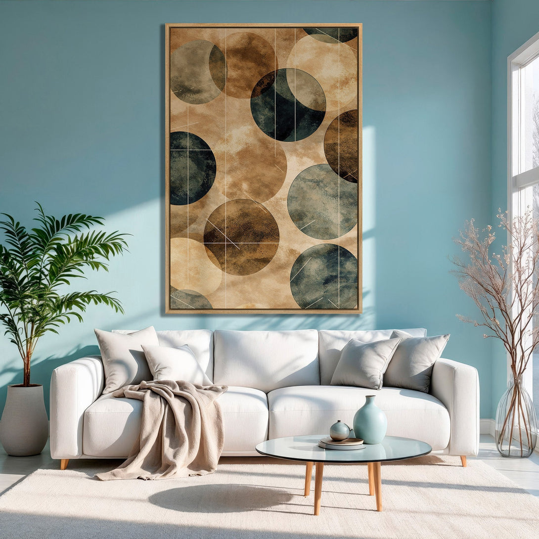 Framed Wall Art featuring abstract circles in neutral and teal tones. Modern art for a stylish living room.