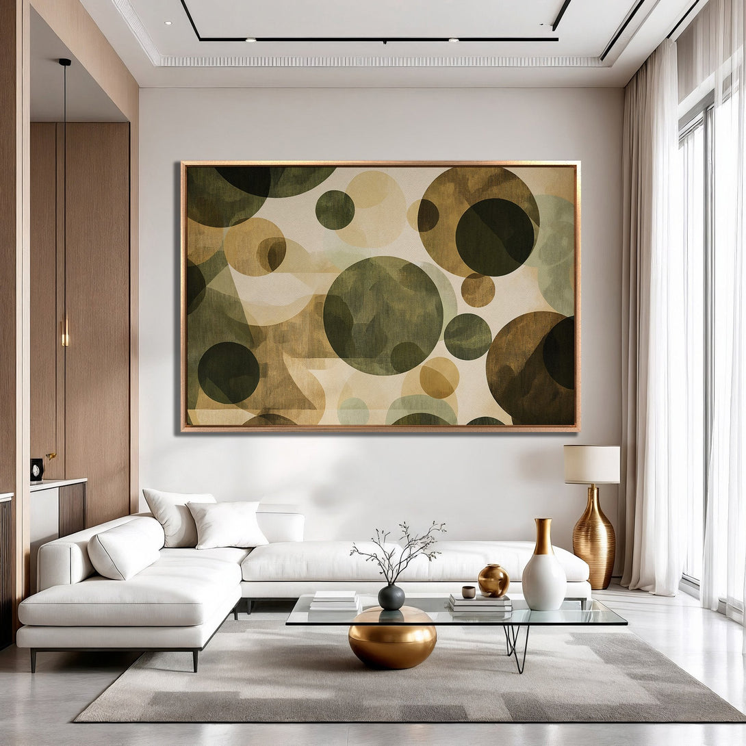 Framed Wall Art featuring abstract circles in earthy tones. Modern art for living room decor. Green, beige, and gold color palette.