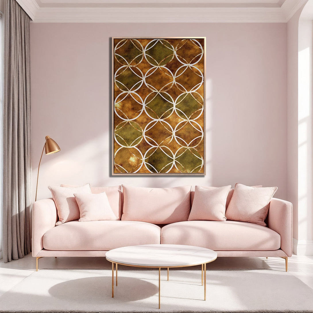 Framed Wall Art featuring a geometric pattern in warm brown and green tones, displayed in a stylish, blush-pink interior.
