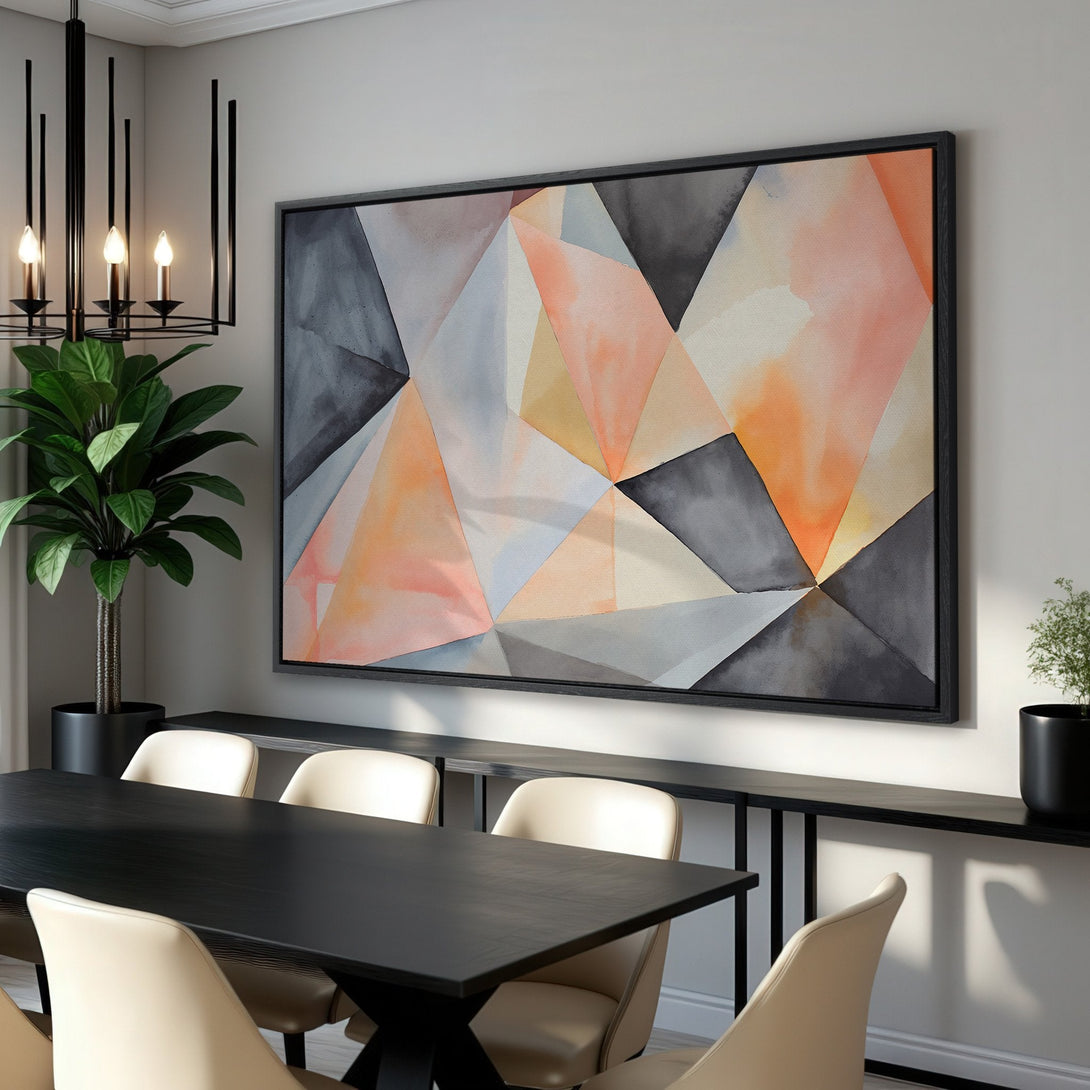 Framed Wall Art: Geometric abstract canvas print in a modern dining room. Features a watercolor-style design with a muted color palette of gray, peach, and orange.