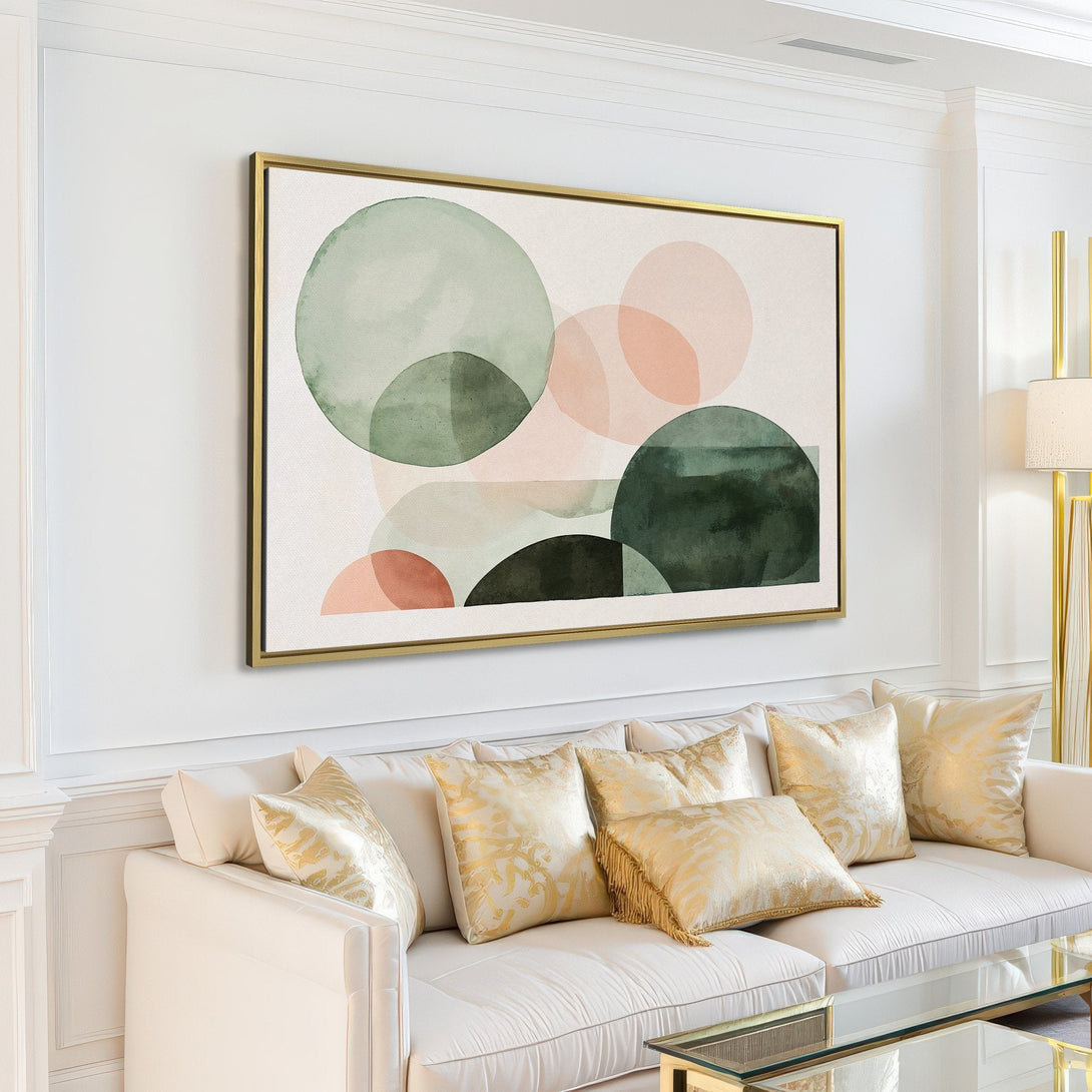 Abstract Canvas Print in a modern living room. Features watercolor circles in muted green and peach tones. Perfect for minimalist decor.