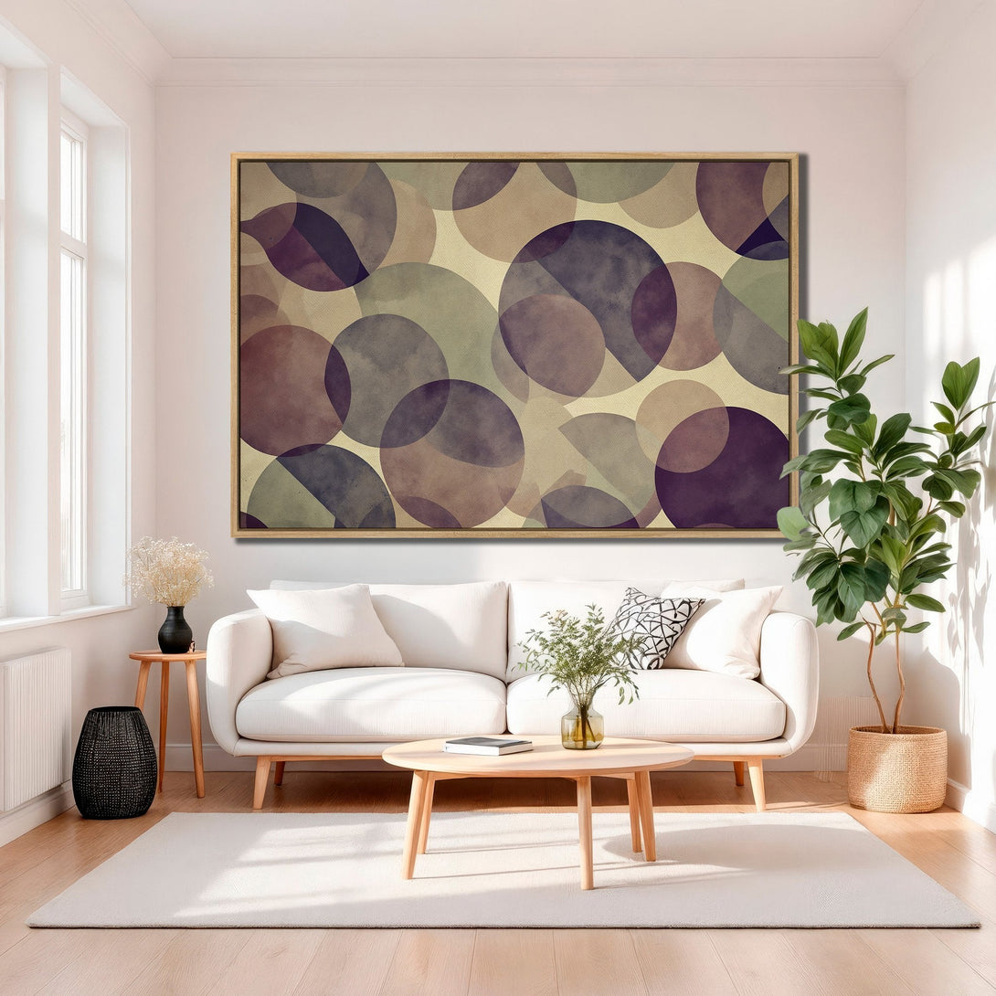 Framed Wall Art featuring abstract circles in a muted purple and beige palette. Modern art piece perfect for living room decor.