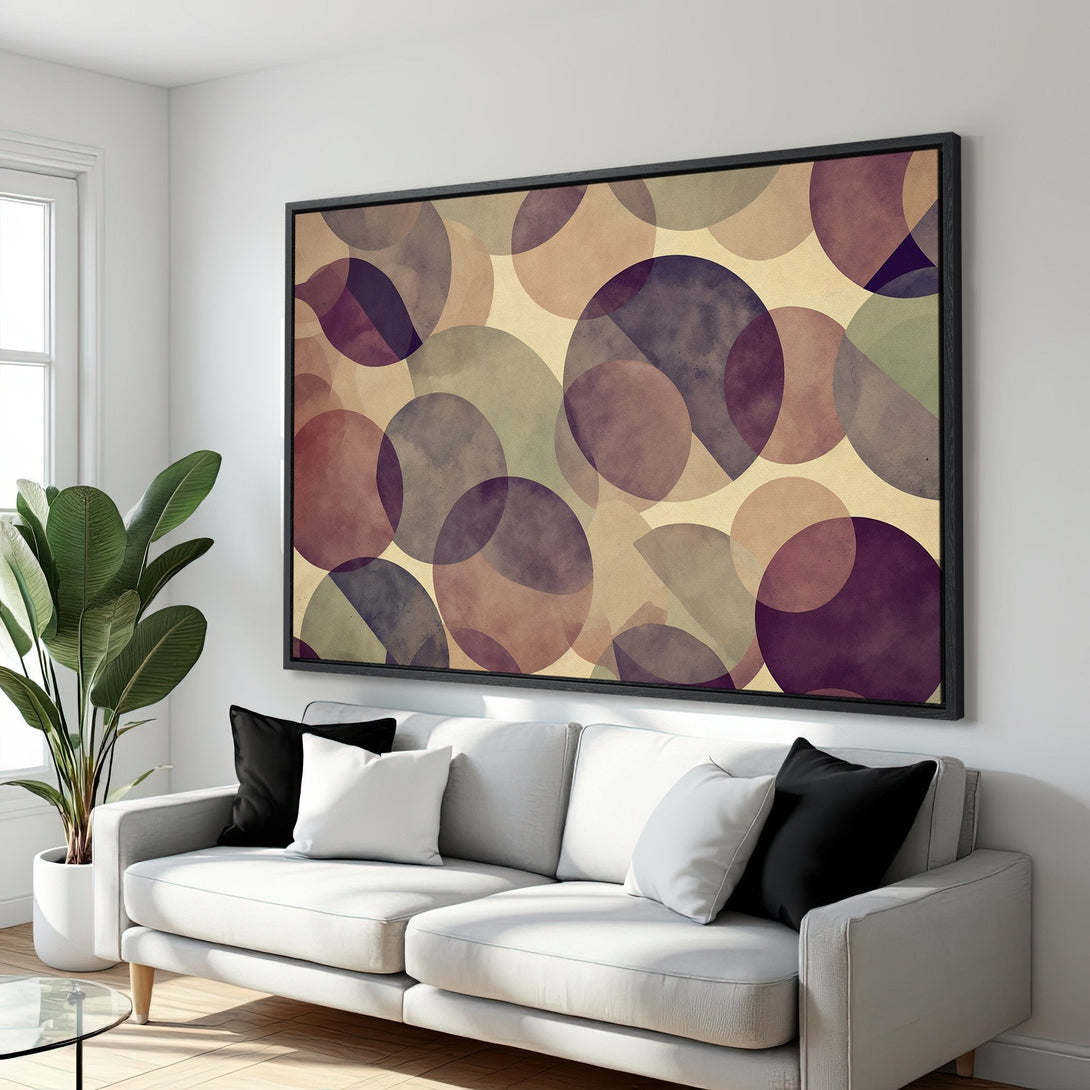 Framed Wall Art featuring an abstract geometric design with overlapping circles in a muted purple and beige color palette, perfect for modern decor.