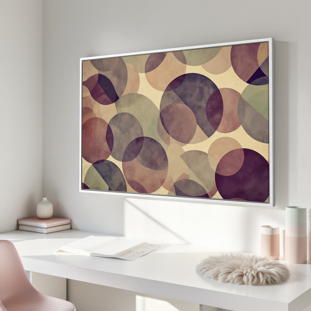 Framed Wall Art featuring an abstract circle design in a muted color palette of purples, greens, and beige. Perfect for modern interior decor.