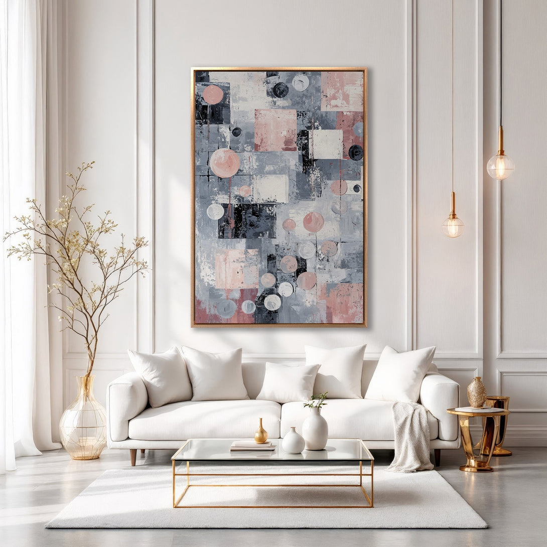 Framed Wall Art: Abstract geometric art in a modern living room. Features a gray, pink, and black color palette, perfect for adding a touch of elegance.
