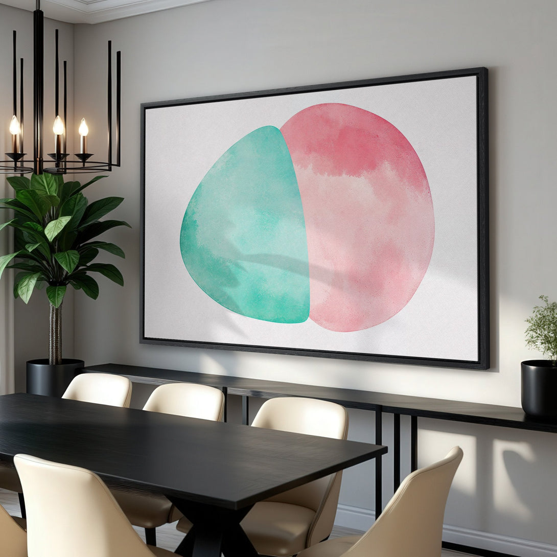 Framed Wall Art: Abstract watercolor art in teal and pink, displayed in a modern dining room. Perfect for adding a pop of color to your space!
