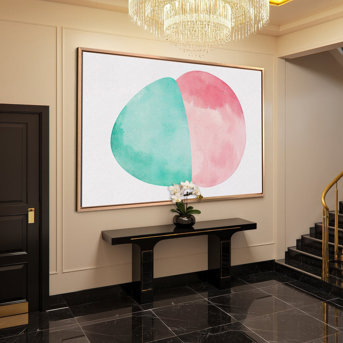 Framed Wall Art: Abstract watercolor canvas print in a modern entryway. Features teal and pink hues. Perfect for adding a pop of color.