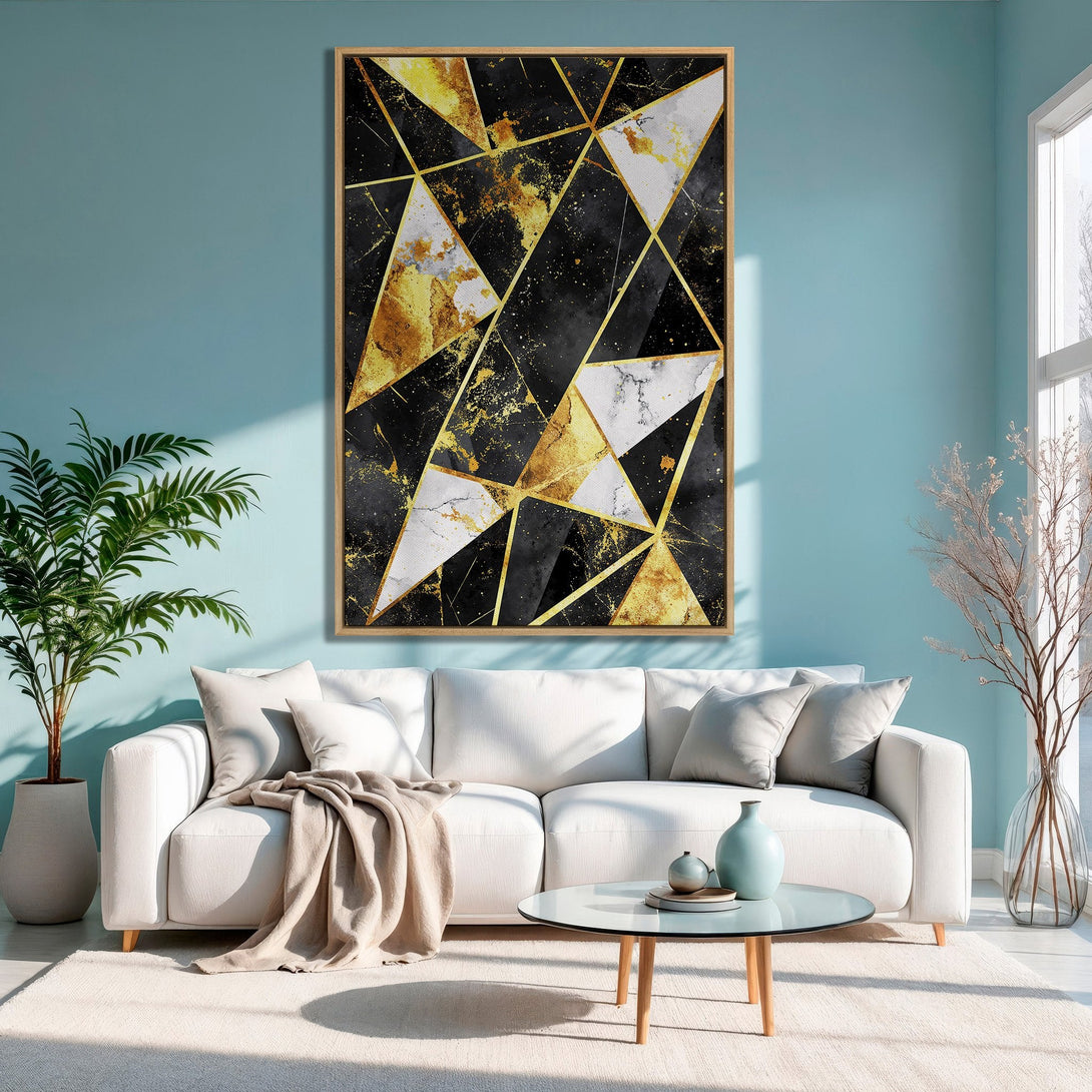 Framed Wall Art: Geometric abstract art in gold, black, and white. Modern Canvas Print adds a touch of luxury to any living room.