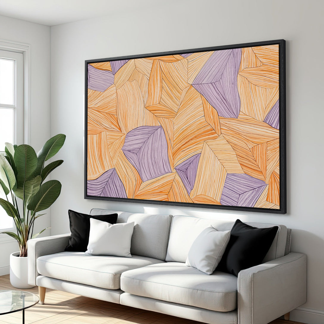 Framed Wall Art featuring an abstract geometric design in warm orange and purple tones. Modern art for your living room.