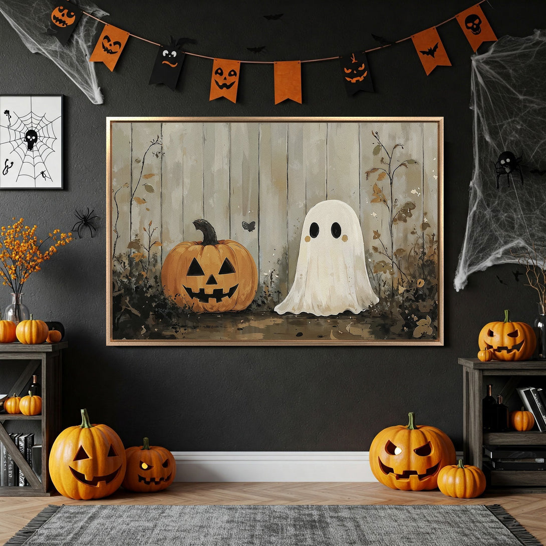 Framed Wall Art featuring a Halloween scene with a ghost and pumpkin. Rustic style with warm orange and neutral tones. Perfect for spooky decor!