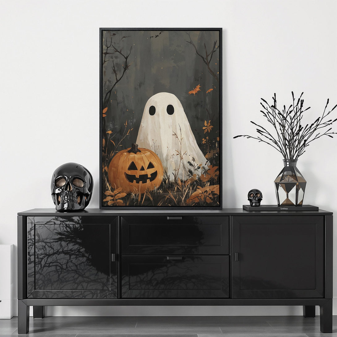 Framed Wall Art: Spooky Halloween ghost and pumpkin art in a dark, moody color palette. Perfect for adding a touch of eerie elegance to your home decor.