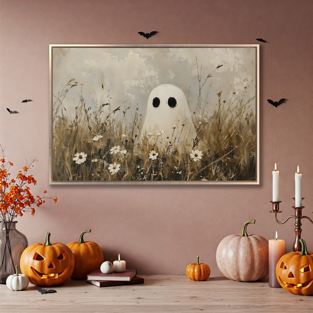 Framed Wall Art: Whimsical ghost painting in neutral tones. Perfect Halloween decor! Adds a touch of spooky charm to any space. Shop now!