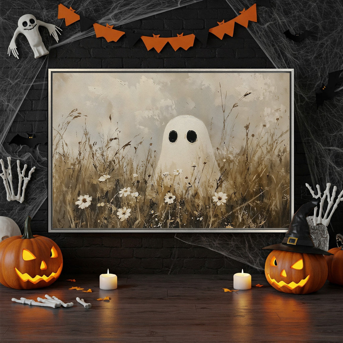 Framed Wall Art featuring a whimsical ghost in a field, painted in a neutral color palette. Perfect Halloween decor!