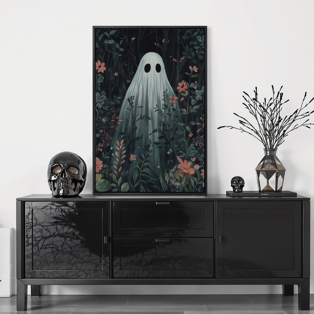 Framed Wall Art featuring a whimsical ghost in a moody forest scene. Dark, botanical style with a muted green and peach color palette. Perfect for Halloween decor!